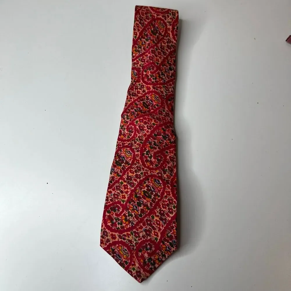 Liberty of London vintage red patterned silk necktie features a vibrant tie